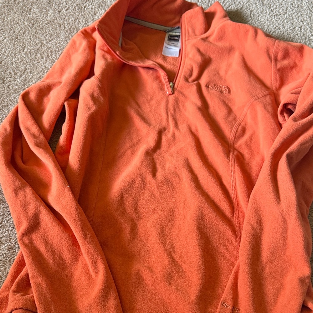 The north face women’s fleece women’s zip
Up orange medium